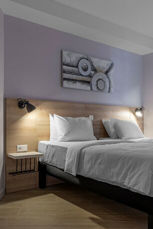 Imagen de la habitación del Hotel KONTRAKT Boutique. Foto 12