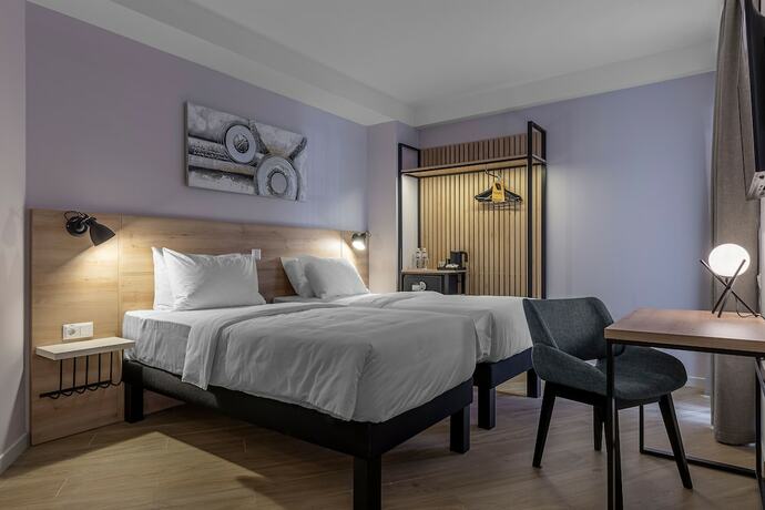 Imagen de la habitación del Hotel KONTRAKT Boutique. Foto 14