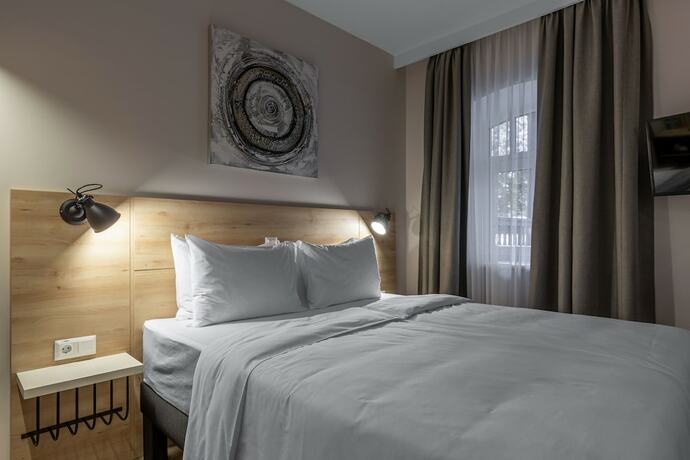 Imagen de la habitación del Hotel KONTRAKT Boutique. Foto 15