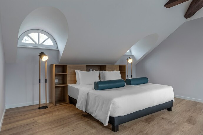 Imagen de la habitación del Hotel KONTRAKT Boutique. Foto 17