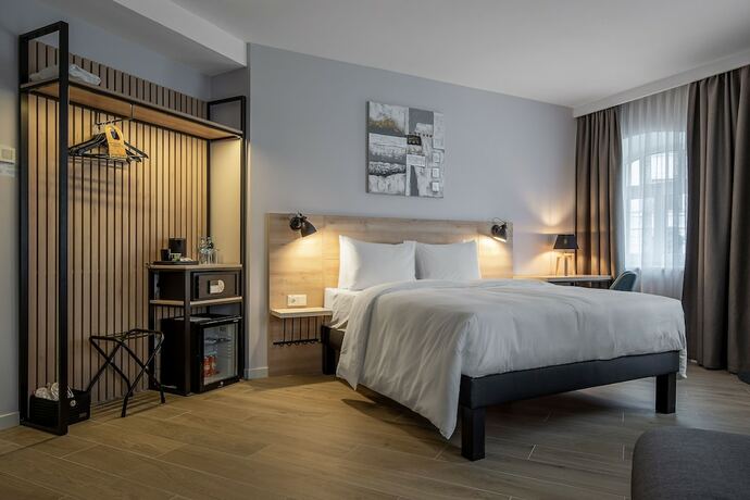 Imagen de la habitación del Hotel KONTRAKT Boutique. Foto 18