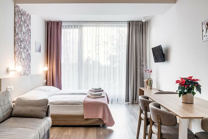 Imagen de la habitación del Hotel KORA APARTMENTS. Foto 15