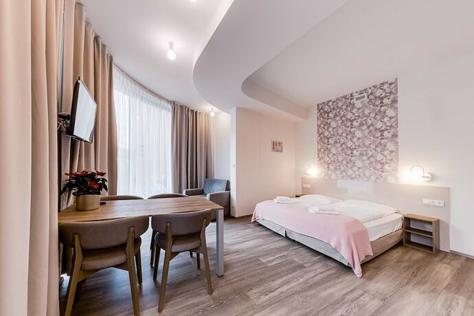 Imagen de la habitación del Hotel KORA APARTMENTS. Foto 16