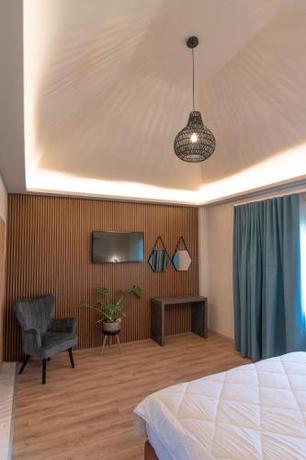 Imagen de la habitación del Hotel KOSMAPOLITAN hotel. Foto 19