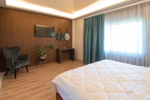 Imagen de la habitación del Hotel KOSMAPOLITAN hotel. Foto 20