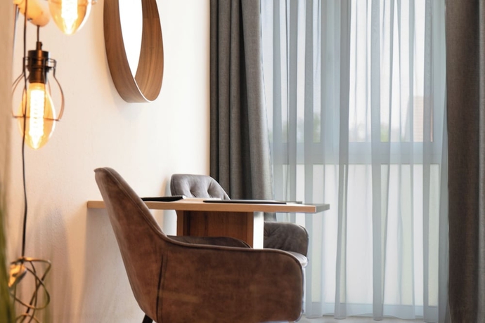 Imagen de la habitación del Hotel KRACHER. Foto 9