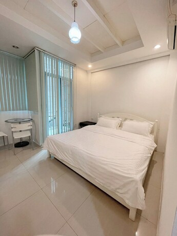 Imagen de la habitación del Hotel KS Suites. Foto 19