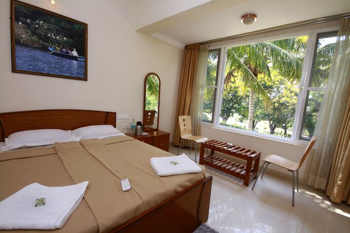 Imagen de la habitación del Hotel KSTDC Mayura Kauvery. Foto 13