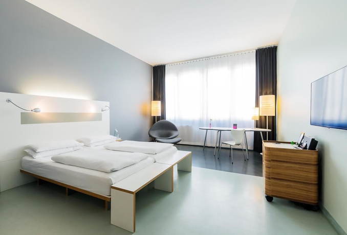 Imagen de la habitación del Hotel KU'DAMM 101. Foto 5