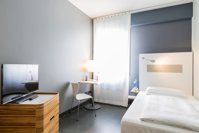 Imagen de la habitación del Hotel KU'DAMM 101. Foto 9