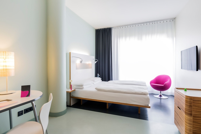 Imagen de la habitación del Hotel KU'DAMM 101. Foto 10