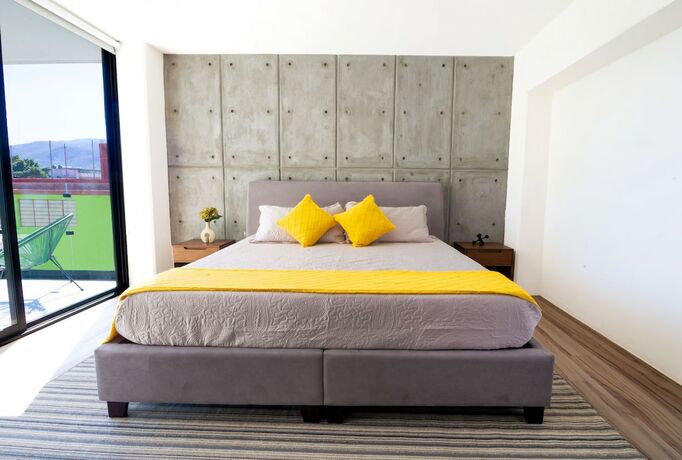 Imagen de la habitación del Hotel KUKO SUITES. Foto 15