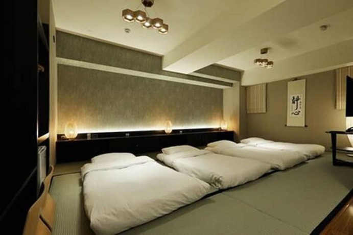 Imagen de la habitación del Hotel KUN Tour Feng Chai. Foto 4
