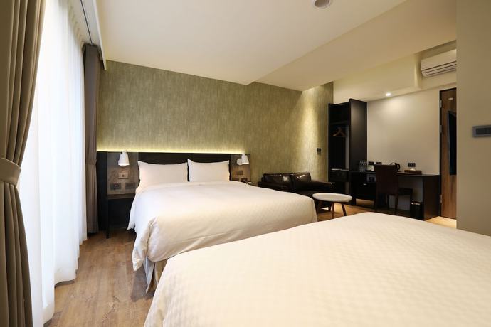 Imagen de la habitación del Hotel KUN Tour Feng Chai. Foto 5