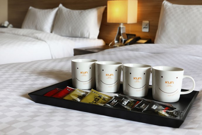 Imagen de la habitación del Hotel KUN Tour Feng Chai. Foto 9