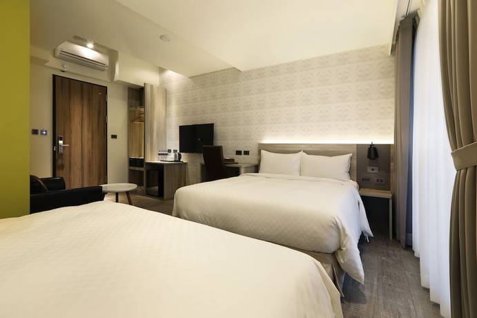 Imagen de la habitación del Hotel KUN Tour Feng Chai. Foto 11