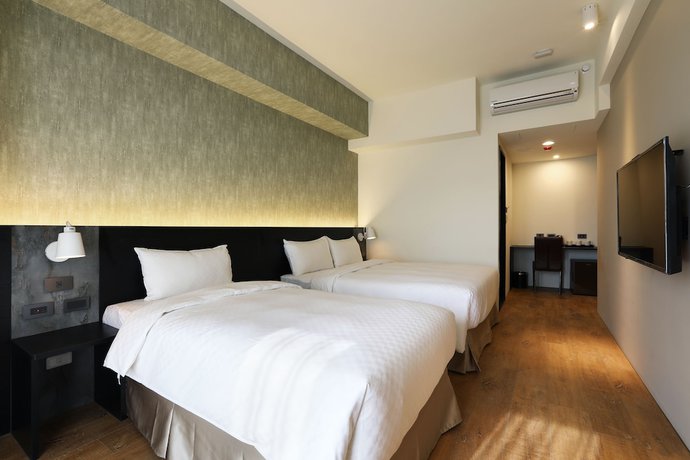Imagen de la habitación del Hotel KUN Tour Feng Chai. Foto 13