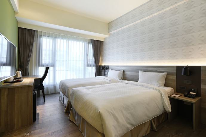 Imagen de la habitación del Hotel KUN Tour Feng Chai. Foto 14