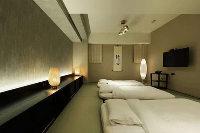 Imagen de la habitación del Hotel KUN Tour Feng Chai. Foto 16