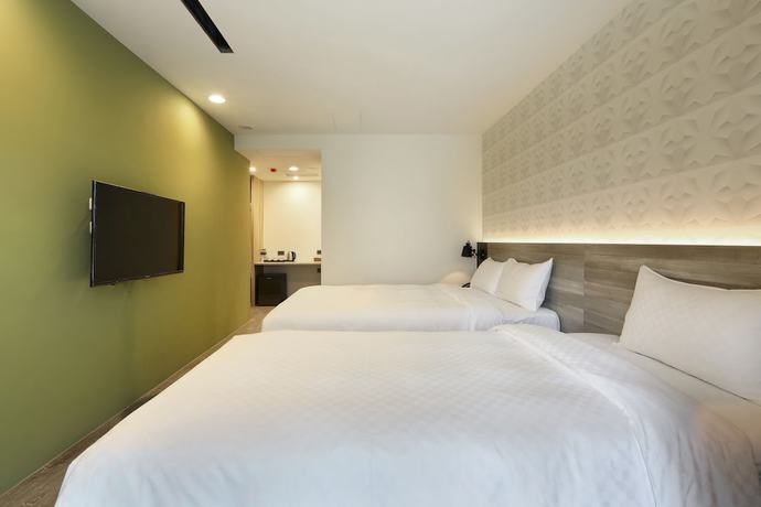 Imagen de la habitación del Hotel KUN Tour Feng Chai. Foto 17