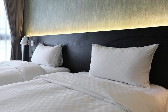 Imagen de la habitación del Hotel KUN Tour Feng Chai. Foto 18