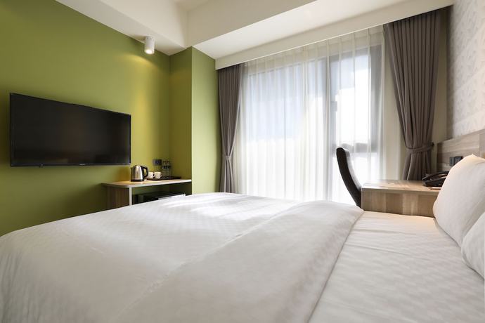 Imagen de la habitación del Hotel KUN Tour Feng Chai. Foto 19