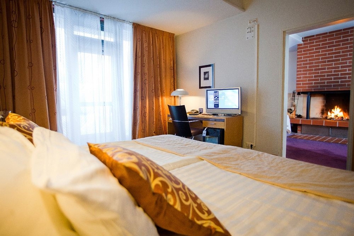 Imagen de la habitación del Hotel KUNINKAANTIE HOTEL. Foto 2