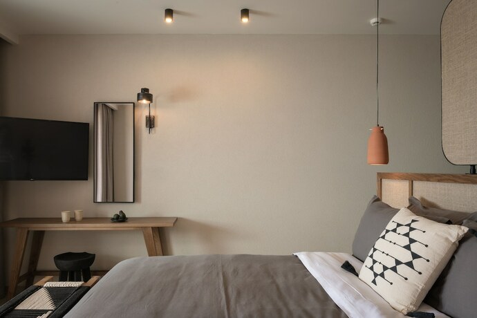 Imagen de la habitación del Hotel KYMĀNI Boutique and Suites. Foto 13