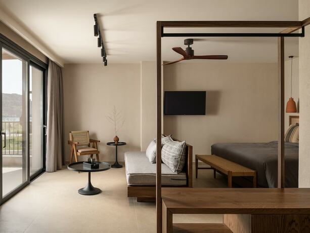 Imagen de la habitación del Hotel KYMĀNI Boutique and Suites. Foto 14