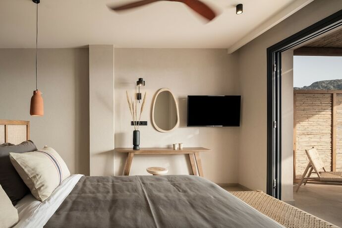 Imagen de la habitación del Hotel KYMĀNI Boutique and Suites. Foto 15