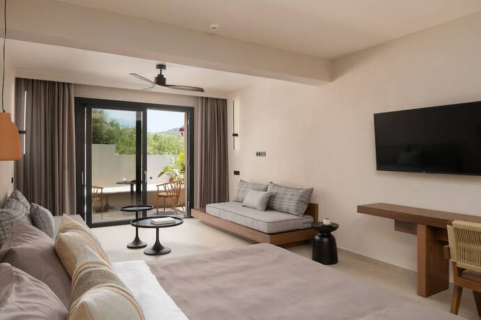 Imagen de la habitación del Hotel KYMĀNI Boutique and Suites. Foto 17