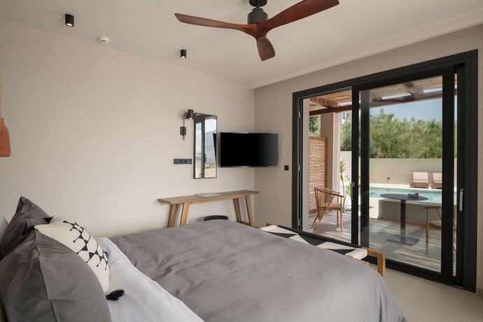 Imagen de la habitación del Hotel KYMĀNI Boutique and Suites. Foto 18