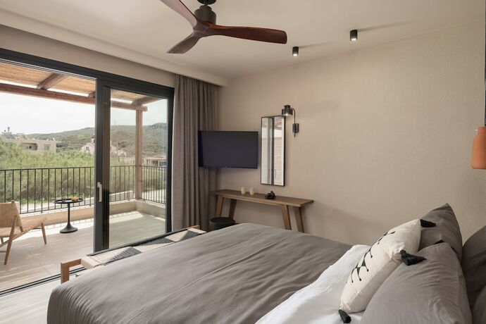 Imagen de la habitación del Hotel KYMĀNI Boutique and Suites. Foto 19