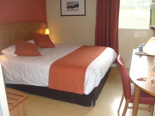 Imagen de la habitación del Hotel KYRIAD GRENOBLE SEYSSINS. Foto 9