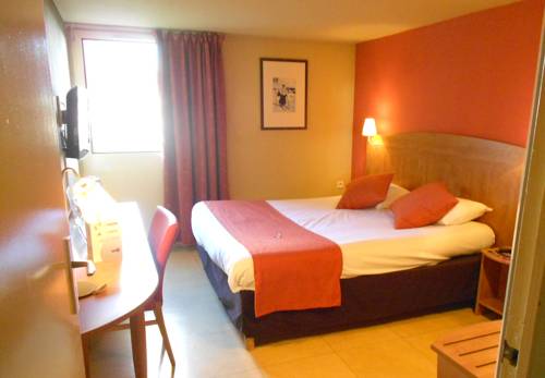 Imagen de la habitación del Hotel KYRIAD GRENOBLE SEYSSINS. Foto 14