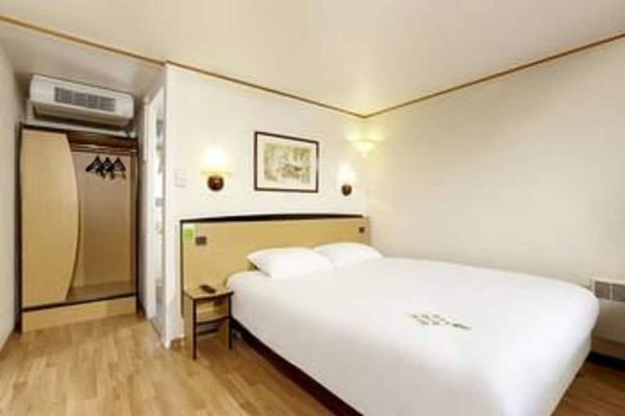 Imagen de la habitación del Hotel KYRIAD HONFLEUR - La Riviere Saint Sauveur. Foto 14