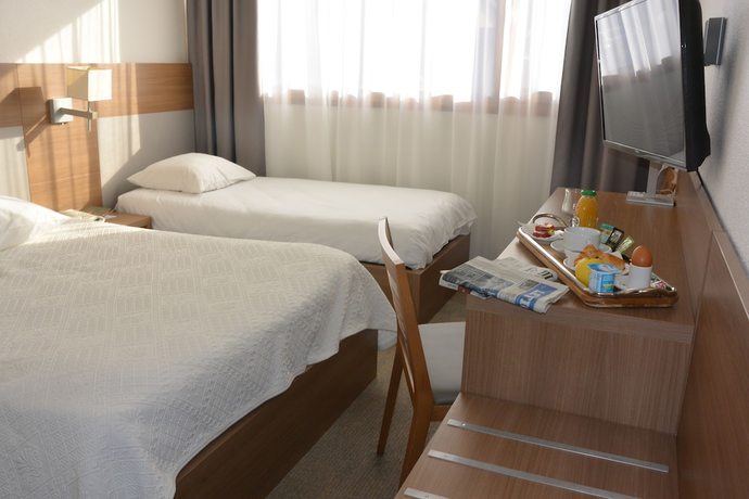 Imagen de la habitación del Hotel KYRIAD LYON EST - Genas Eurexpo. Foto 2