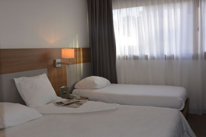 Imagen de la habitación del Hotel KYRIAD LYON EST - Genas Eurexpo. Foto 5