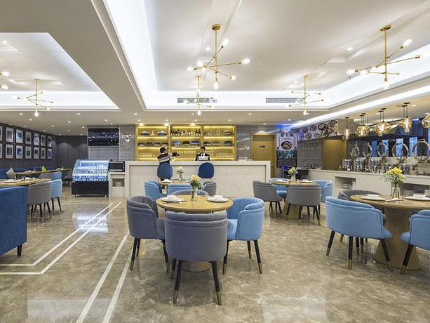 Imagen del bar/restaurante del Hotel KYRIAD MARVELOUS HOTELA SHANGHAI JIADING XINCHENG. Foto 8