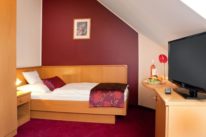 Imagen de la habitación del Hotel Kálvária. Foto 13