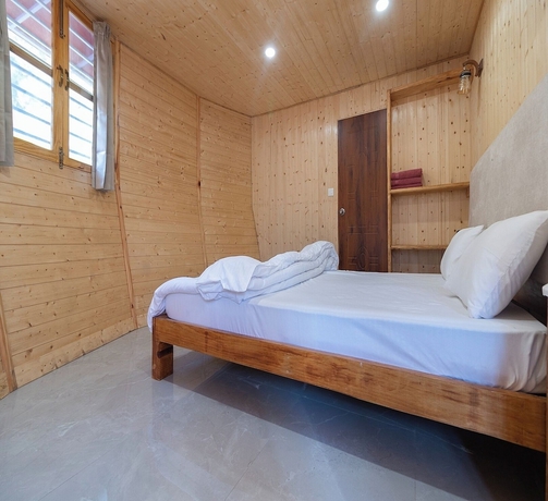 Imagen de la habitación del Hotel Kaafal Cottages The Himalayan Home. Foto 9