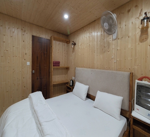 Imagen de la habitación del Hotel Kaafal Cottages The Himalayan Home. Foto 11