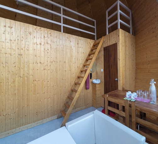 Imagen de los interiores del Hotel Kaafal Cottages The Himalayan Home. Foto 16
