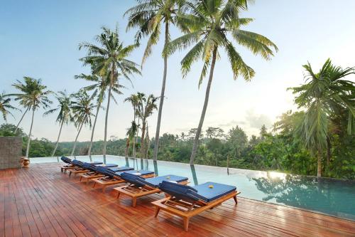 Imagen de la piscina del Hotel Kaamala Luxury Resort and Spa Ubud by Ini Vie Hospitality. Foto 9