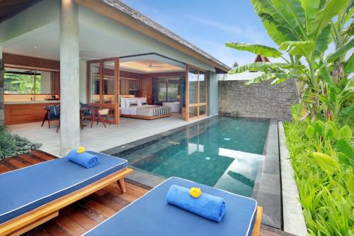 Imagen de la habitación del Hotel Kaamala Resort & Spa Ubud by iNi Vie Hospitality. Foto 2