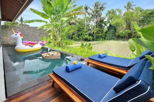 Imagen de la habitación del Hotel Kaamala Resort & Spa Ubud by iNi Vie Hospitality. Foto 4