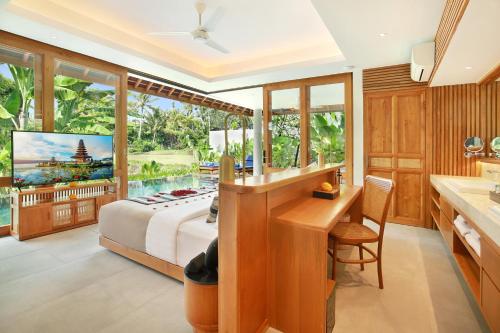 Imagen de la habitación del Hotel Kaamala Resort & Spa Ubud by iNi Vie Hospitality. Foto 6