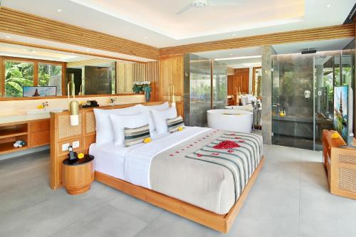 Imagen de la habitación del Hotel Kaamala Resort & Spa Ubud by iNi Vie Hospitality. Foto 7