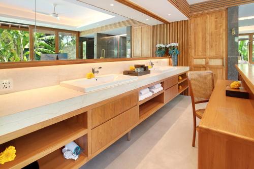 Imagen de la habitación del Hotel Kaamala Resort & Spa Ubud by iNi Vie Hospitality. Foto 8