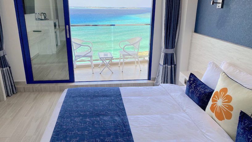 Imagen de la habitación del Hotel Kaani Palm Beach. Foto 10